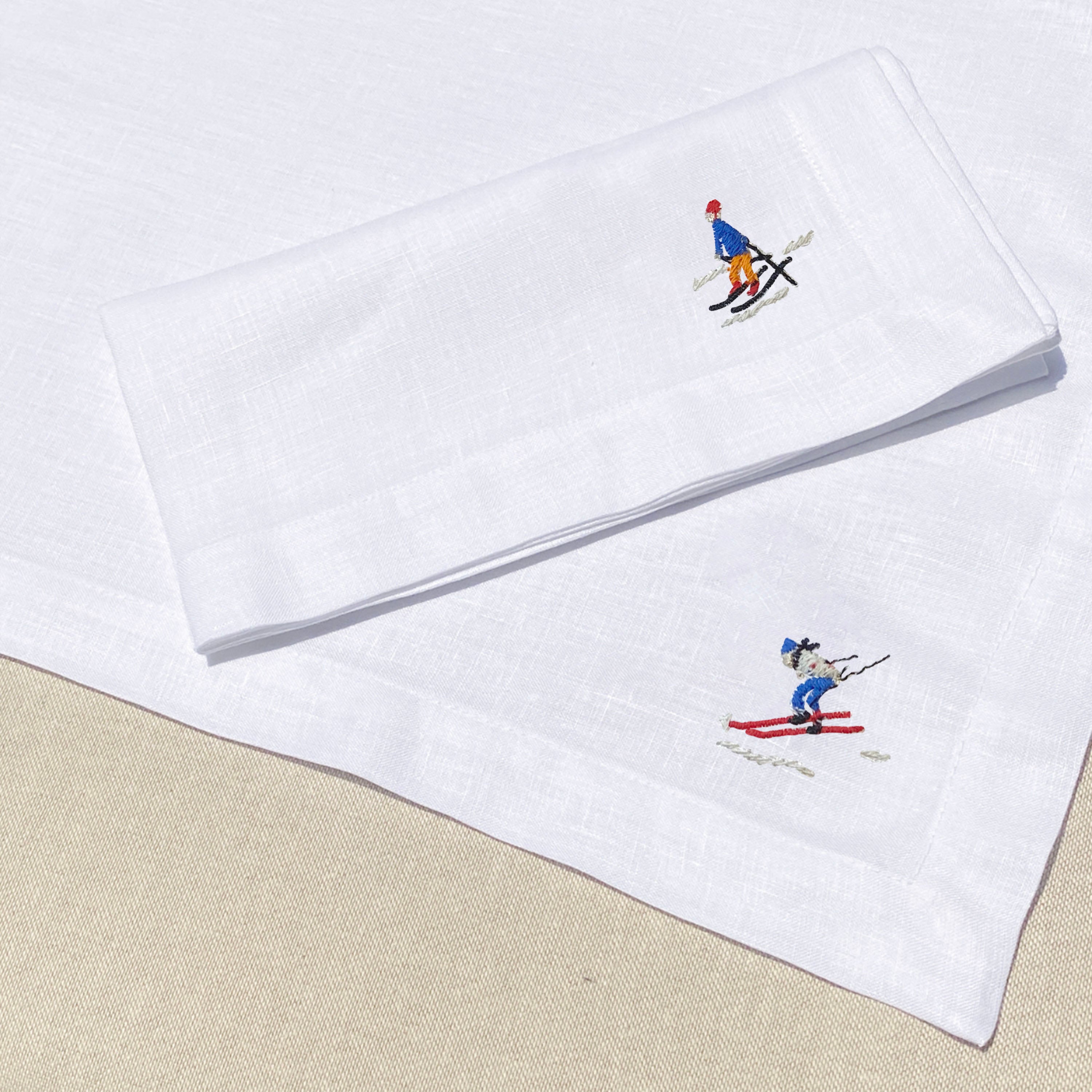 individual con servilleta de lino bordado esquiadores solos - Barioles Casa