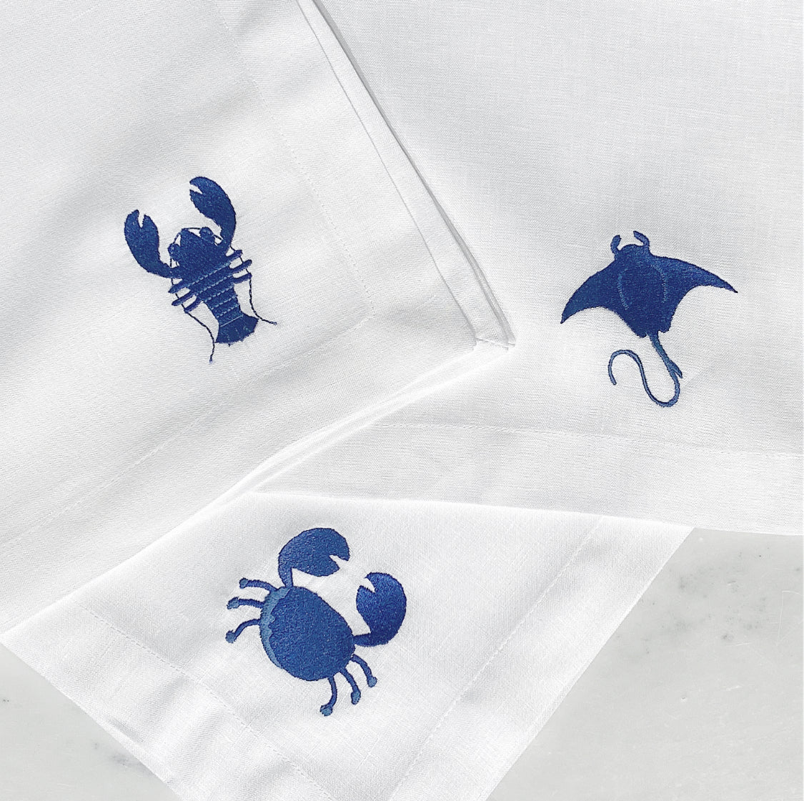 individual y servilleta de lino bordado mariscos - Barioles Casa